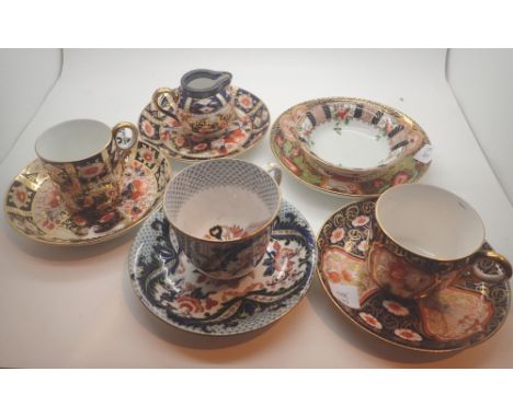 Three Victorian Davenport Imari pattern tea cups two saucers and a cream jug