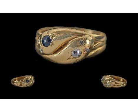 Ladies Pleasing 18ct Gold Double Headed Snake Ring Set with Diamond Eyes and Sapphires to Top of Snakes Head, Marked to Shank
