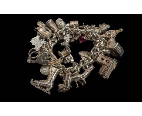 A Fine Vintage Sterling Silver Curb Bracelet Loaded with Approx 30 Silver Charms. All Marked for Silver. Various Subjects, So