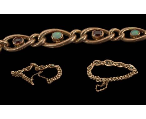 Antique Period - Ladies 9ct Gold Opal and Garnet Set Bracelet, Marked 9ct. Opals and Garnets of Good Colour, Weight 10.7 gram