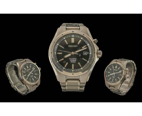 Seiko Kinetic Titanium Gents Wrist Watch. Movement Japan 5MB2-OBF8-R2. Features Black Dial, Silver Markers, Just / Date Displ