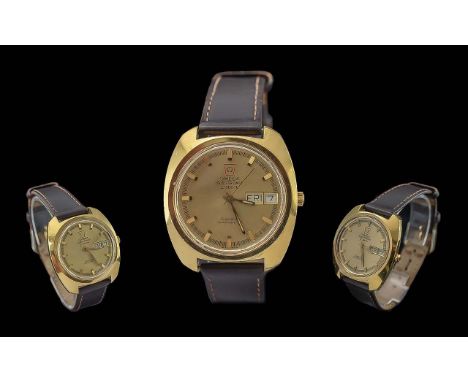 Omega Electronic F300HZ Gents Chronometer Gold on Steel Wrist Watch, features day/date display window, champagne dial, chrono