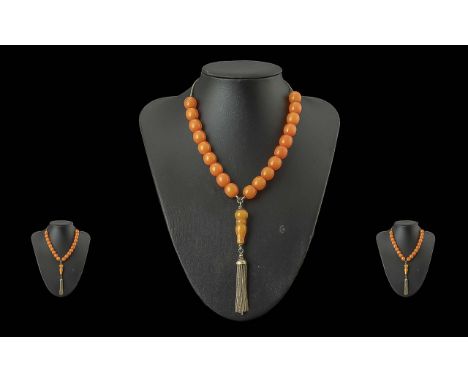 A Vintage Good Quality Butterscotch Amber Necklace with Tazzle.  Length 20'' - 50 cm.  Weight 26.7 grams.