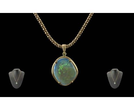 Ladies Fine Quality 14ct Gold Opal Set Pendant Attached to a 9ct Beaded Design Chain. Both Pendant and Chain Marked for 9ct. 
