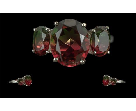 Bi-Colour Watermelon Quartz Three Stone Ring, each stone with an ombre of bluish green into warm red, resembling bi-colour to
