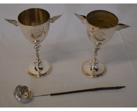 2 silver plated cups flanked with ornate wings and the Caduceus / Kerukeion symbol twisting around the centre stems, engraved