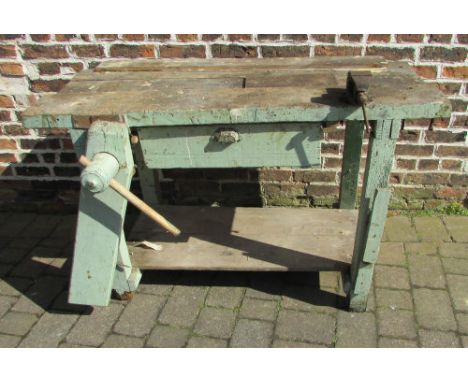 Workbench with drawer containing assorted tools