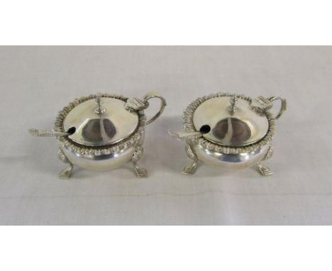 Pair of silver mustard pots with spoons Sheffield 1933 Maker William Hutton & Sons Ltd total weight 4.39 oz