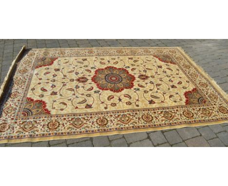 Gold ground Kashmir carpet with a medallion design, 200cm x 300cm
