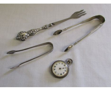 2 silver sugar tongs London 1868 & 1888 total weight 1.17 oz, silver handled pickle fork Chester 1903 & a silver ladies swiss