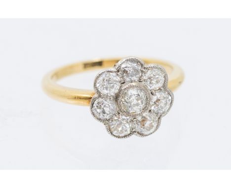 A diamond and 18ct gold cluster ring, comprising a flower cluster of old European cut diamonds, total diamond weight approx 1