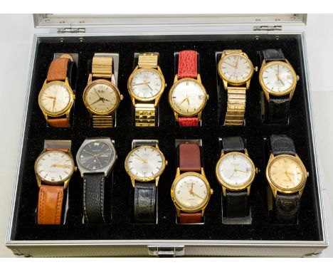 A cased collection of  twelve vintage gents wristwatches to include plated versions all on leather straps, all with round dia