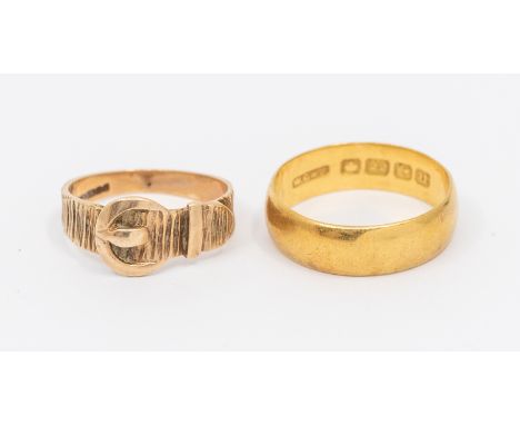 A 22ct gold band, width approx 6mm, size R, Birmingham 1919, weight approx 6gms, along with a 9ct gold buckle ring with textu