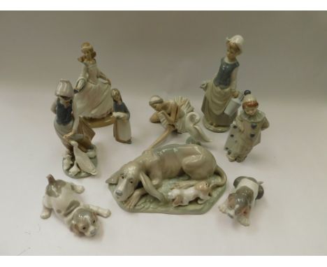 A collection of 20th century Spanish Lladro figurines of young adults and animals