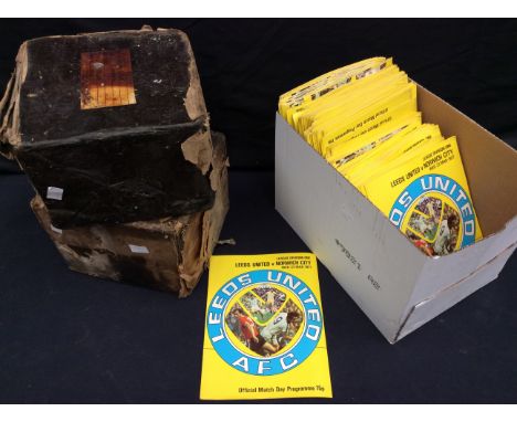 A collection of Leeds United programmes along with two full boxes of Mallory vintage radio valves.