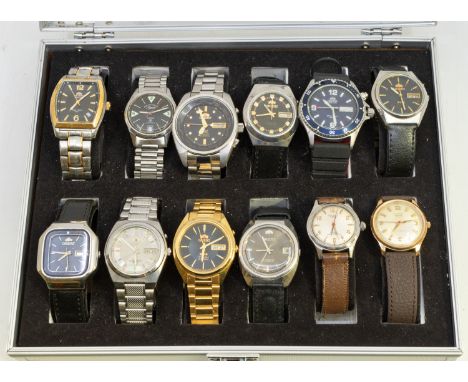 A cased collection of twelve vintage and later gents wristwatches, comprising steel and plated watches, with automatic, self 