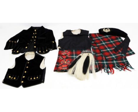 A child's costume with cap badge for Cameronians Scottish Rifles 1881-1968, includes kilt, sporran, waistcoat, jacket, cap an