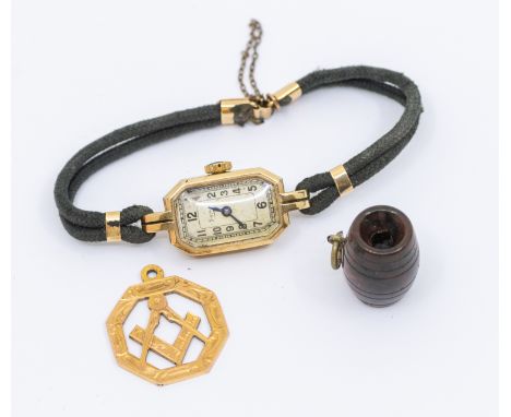 A ladies 9ct gold Mappin wristwatch, circa 1930's comprising a rectangular silvered dial Arabic markers, case approx 13 x 20m