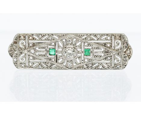 Art Deco diamond and emerald platinum brooch, comprising a central collet set old European cut diamond approx 0.16ct, rub-ove