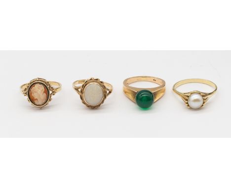 A collection of gold rings to include a pearl set 14ct gold ring, size N1/2, along with a green agate and 14ct gold bead ring