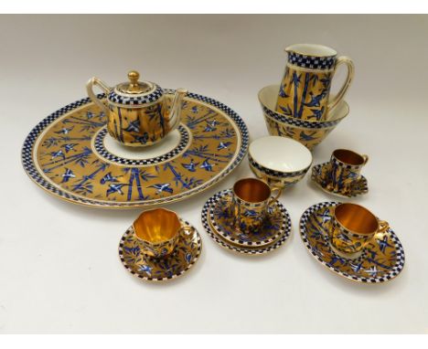 Blue bird tea ware by Coalport , to include miniature cups , saucers , coffee cans, serving plate , sugar & cream , teapot et