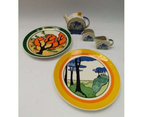 A Wedgwood Clarice Cliff Teapot, Sugar &amp; Cream , in the crocus design, in a presentation box , together with 2 Wedgwood C