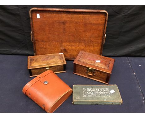 An Edwardian treen tray table top boxed vintage croquet game, two treen trinket boxes and cased WWI binoculars.&nbsp;