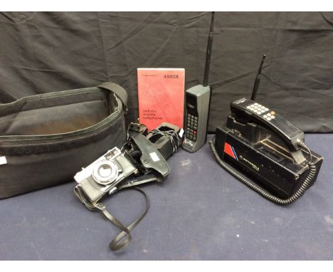 Vintage Technology; a Motorola 4500X car telephone; Motorola 8500X telephone and an Olympus 35-SP digital camera