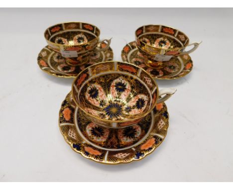 3 Royal Crown Derby Imari 1206 pattern tea cups and saucers together with another 1206 pattern saucers, all are in good condi