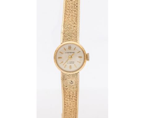 A ladies 9ct gold cased vintage Craftsman wristwatch, comprising round silvered dial with applied gilt baton markers, case ap