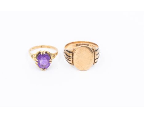 A 9ct rose gold oval signet wing with ridged shoulders, width approx 15mm, size S1/2, along with an amethyst and 9ct gold set