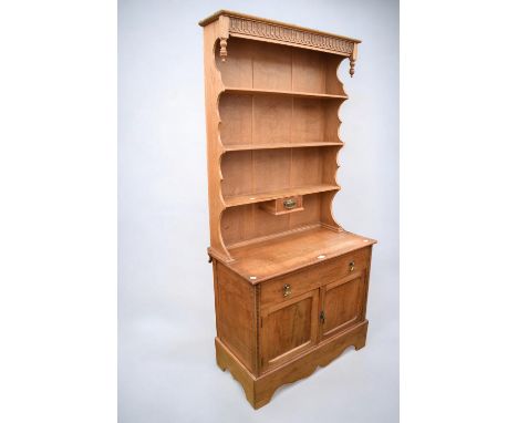 Light oak early 20th century slender kitchen dresser with three plate racks, spice drawer above single large drawer with two 