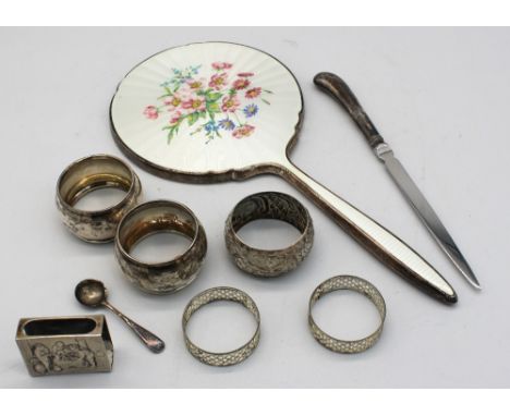 A small collection of silver to include; an Elizabeth II silver and elaborate guilloche enamel hand mirror with enamelled flo