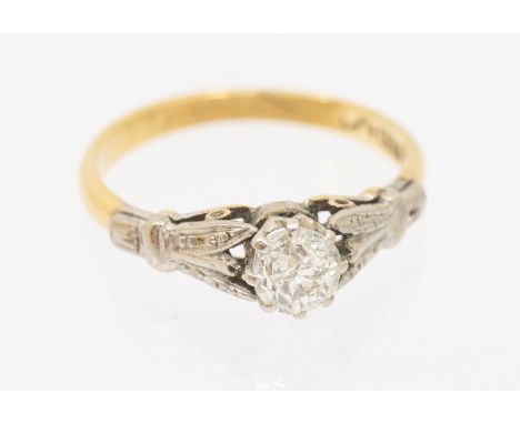 A vintage diamond and 18t gold single stone ring, circa 1930's, comprising an old European cut diamond approx 0.40ct, claw se