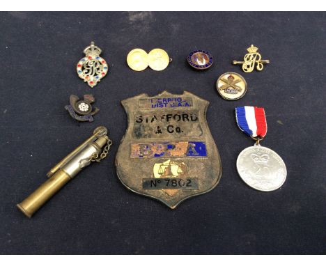 Trench art lighter, military pin badges and Royal badges from early 20th century