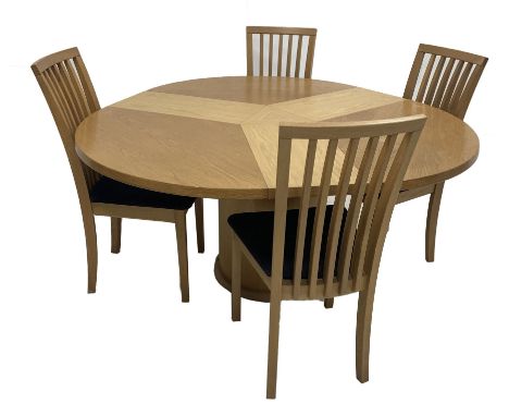 Skovby - Contemporary Danish light oak circular extending dining table (D119cm, H72cm) together with a set of four Skovby lig