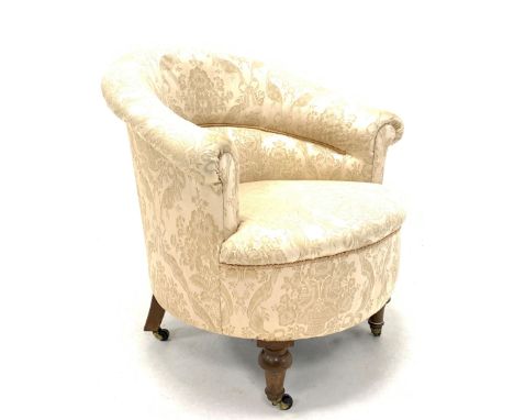 Victorian tub upholstered armchair, upholstered in ivory floral damask fabric, raised on turned walnut supports terminating i