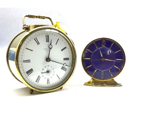 Brass cased drum type alarm clock, white enamel dial with Roman chapter ring inscribed Hyde and Sons Sleaford, (D10cm) togeth