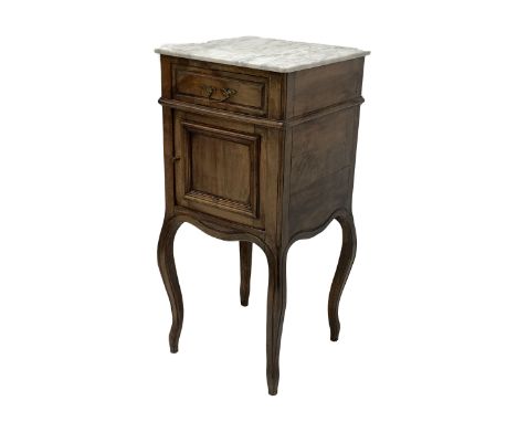 Late 19th century Continental walnut bedside lamp table, with white marble top over drawer and cupboard, raised on moulded ca