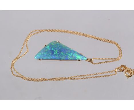 A blue and green opal doublet, in 9ct gold pendant mount, on 9ct gold fine link chain 