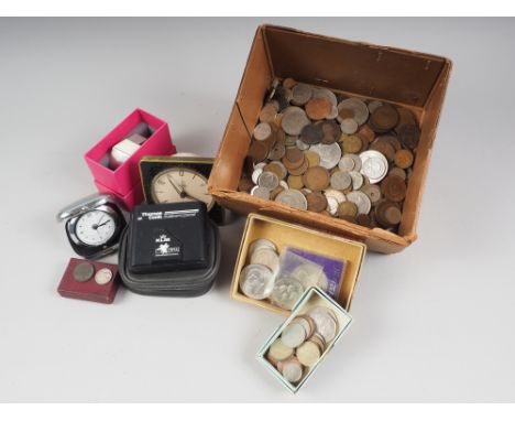 A 19th century tea caddy containing old keys, assorted aftershave bottles, travel clocks and assorted coinage 