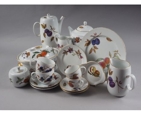 An assortment of Royal Worcester "Evesham" pattern china, including teapot, coffeepots, tureen, cups and saucers (miss-matche