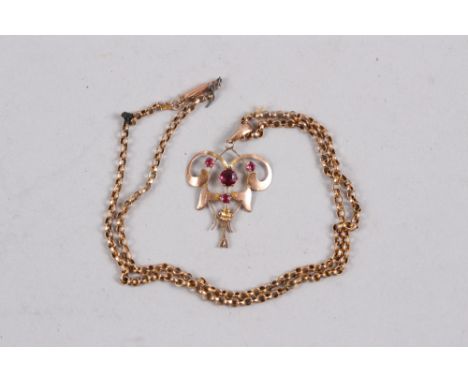 A 9ct gold and garnet set Art Nouveau style pendant, on 9ct gold chain, 4g 