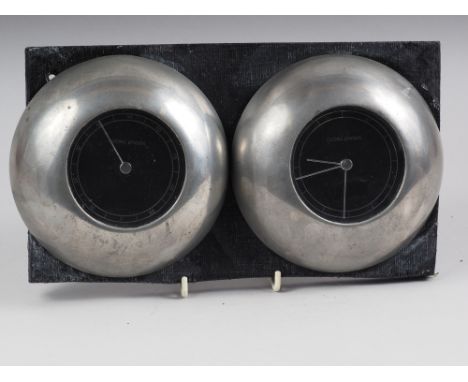 A Georg Jensen clock and barometer set, designed by Andreas Mikkelsen, 5.5" dia, mounted on backboard