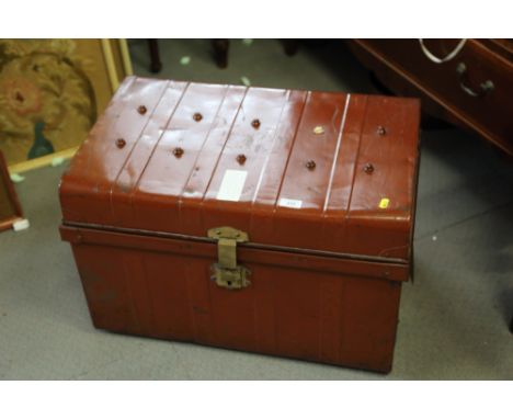 A brown metal travelling trunk, 25 1/2" wide x 17" high 