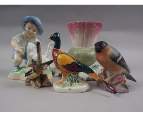 A Royal Worcester Dorothy Doughty china figure, "September", a Worcester china bullfinch, two other small bird models and a G