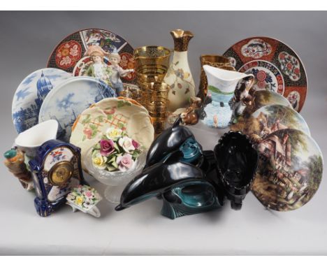 A gilt decorated lemonade set, decorative wall plates, Poole dolphins and assorted decorative china 