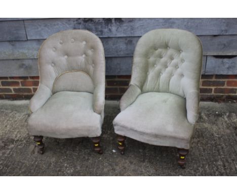 A pair of Victorian button back nursing chairs, upholstered in green velour 