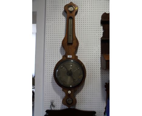 A 19th century banjo barometer with silvered dial, in rosewood case, 40" high 