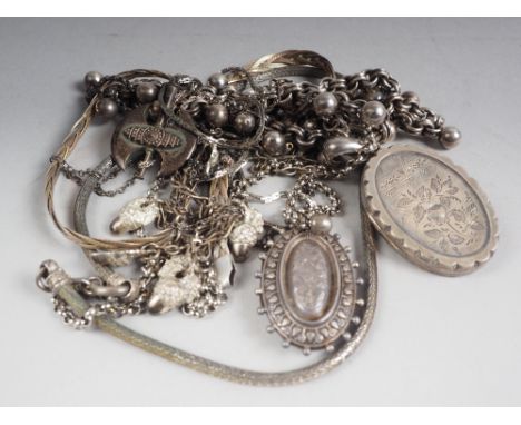 A Victorian silver locket, on chain, and various other silver jewellery 